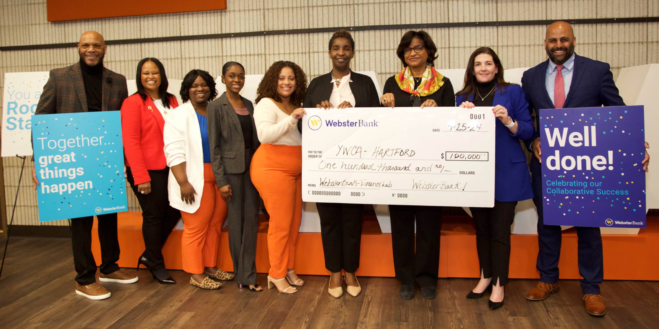 YWCA Hartford Region is presented with a big check for the new Finance Lab